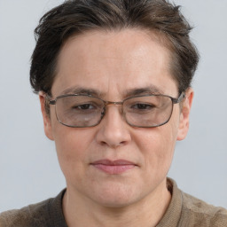 Joyful white adult male with short  brown hair and grey eyes