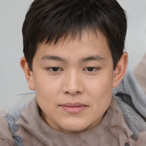 Neutral asian child male with short  brown hair and brown eyes
