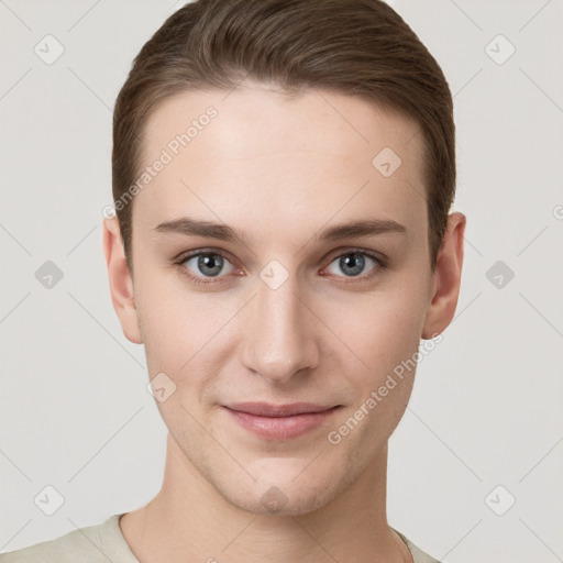 Joyful white young-adult female with short  brown hair and grey eyes