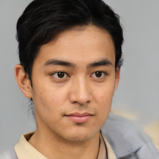 Neutral asian young-adult male with short  brown hair and brown eyes