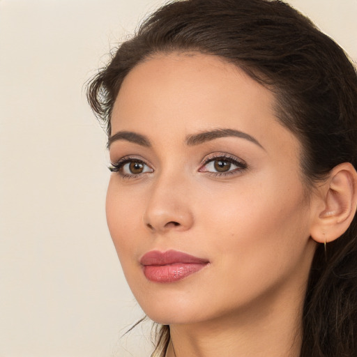 Neutral white young-adult female with long  brown hair and brown eyes