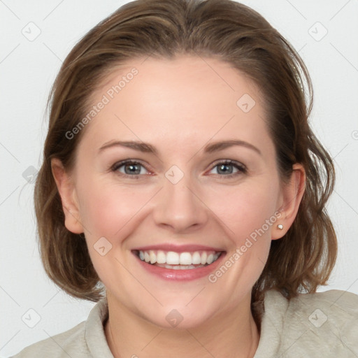 Joyful white young-adult female with medium  brown hair and blue eyes