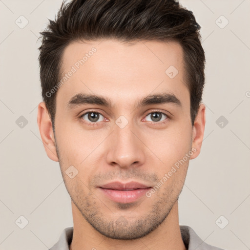 Neutral white young-adult male with short  brown hair and brown eyes