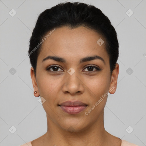 Joyful latino young-adult female with short  black hair and brown eyes