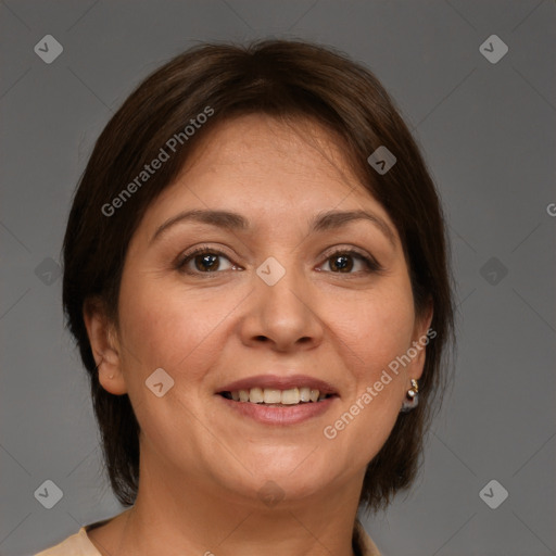 Joyful white adult female with medium  brown hair and brown eyes