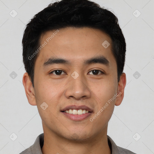 Joyful latino young-adult male with short  black hair and brown eyes