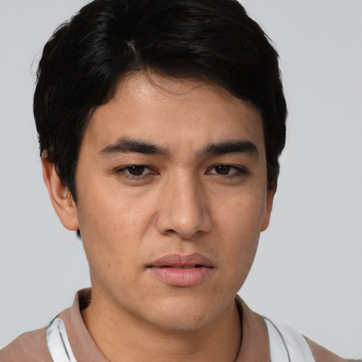 Neutral white young-adult male with short  black hair and brown eyes