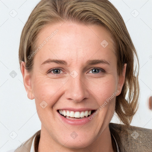 Joyful white young-adult female with medium  brown hair and blue eyes