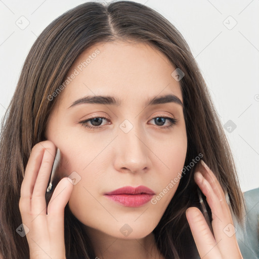 Neutral white young-adult female with long  brown hair and brown eyes