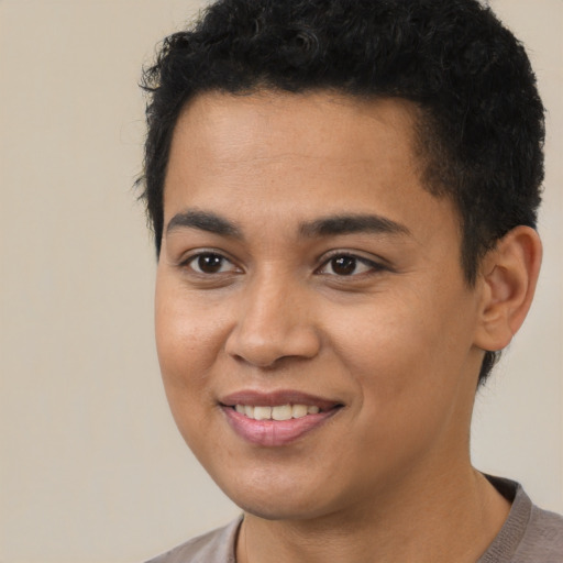 Joyful latino young-adult female with short  brown hair and brown eyes