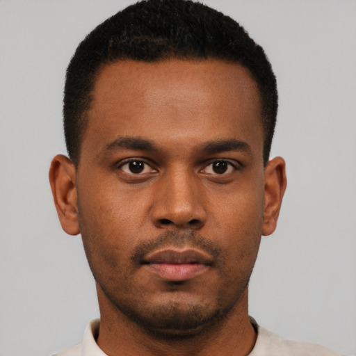 Neutral black young-adult male with short  black hair and brown eyes
