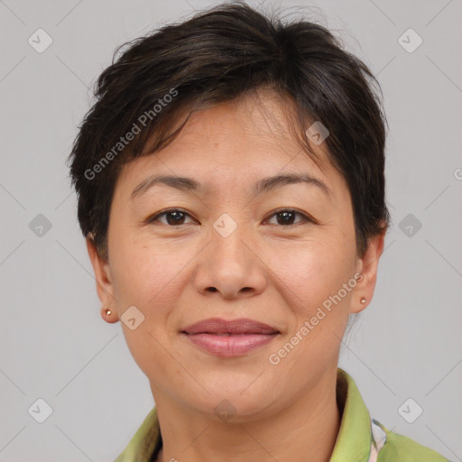 Joyful white adult female with short  brown hair and brown eyes