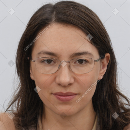 Joyful white adult female with long  brown hair and brown eyes