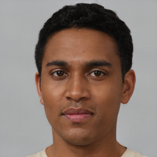 Neutral black young-adult male with short  black hair and brown eyes