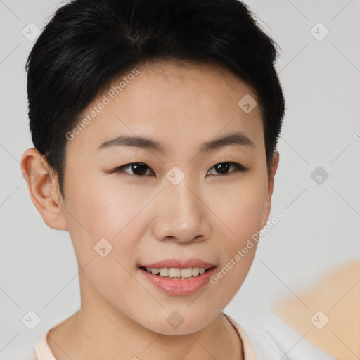 Joyful asian young-adult female with short  brown hair and brown eyes