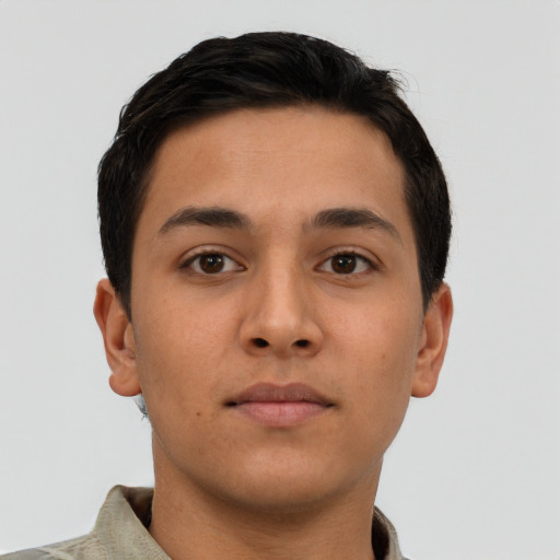 Neutral latino young-adult male with short  brown hair and brown eyes