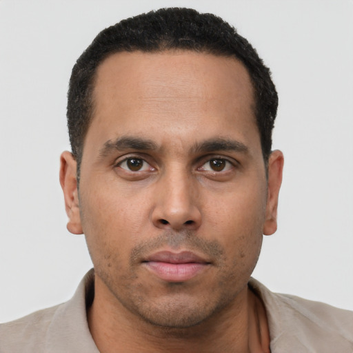 Neutral black young-adult male with short  brown hair and brown eyes