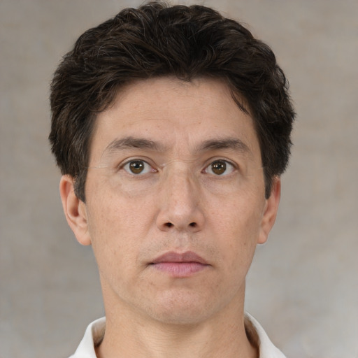 Neutral white adult male with short  brown hair and brown eyes