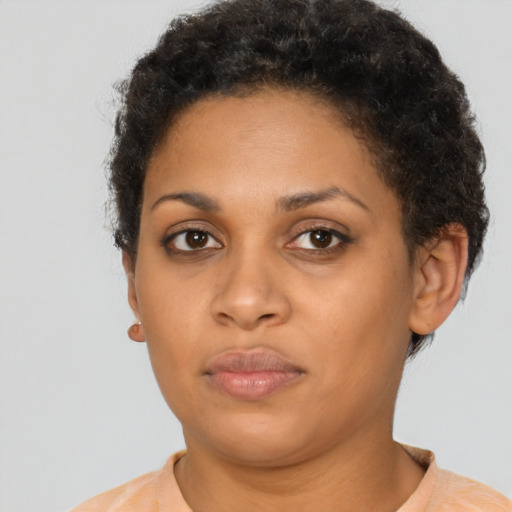 Neutral latino young-adult female with short  brown hair and brown eyes