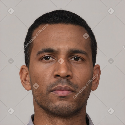 Neutral latino young-adult male with short  black hair and brown eyes