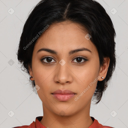 Neutral latino young-adult female with medium  brown hair and brown eyes