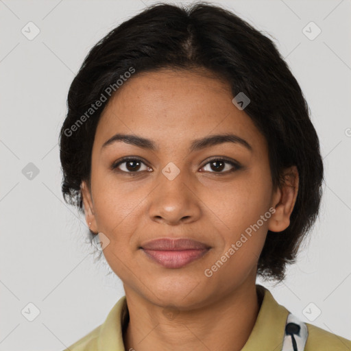 Joyful latino young-adult female with medium  brown hair and brown eyes