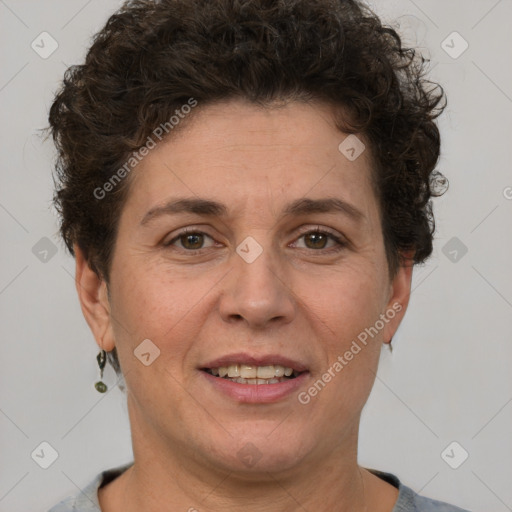 Joyful white adult female with short  brown hair and grey eyes