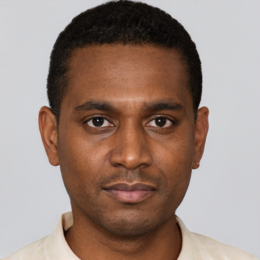 Neutral black young-adult male with short  brown hair and brown eyes