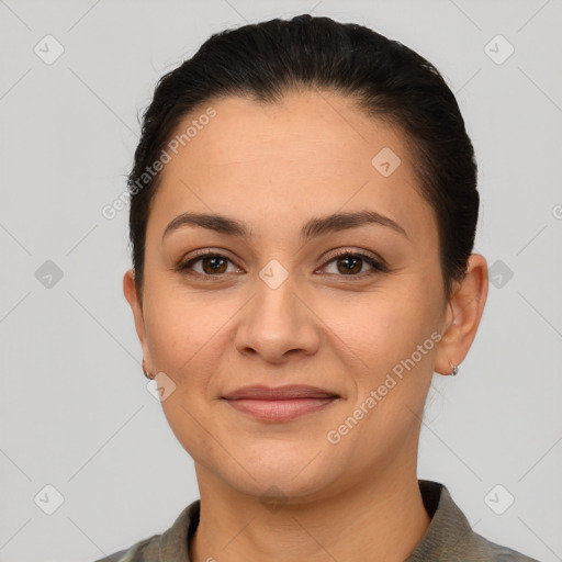 Joyful white young-adult female with short  brown hair and brown eyes