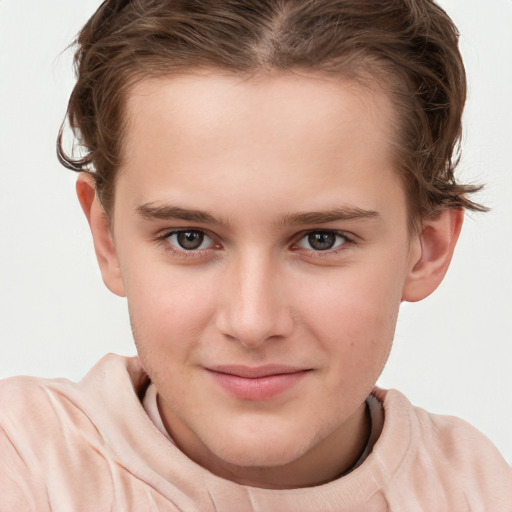 Joyful white child female with short  brown hair and brown eyes