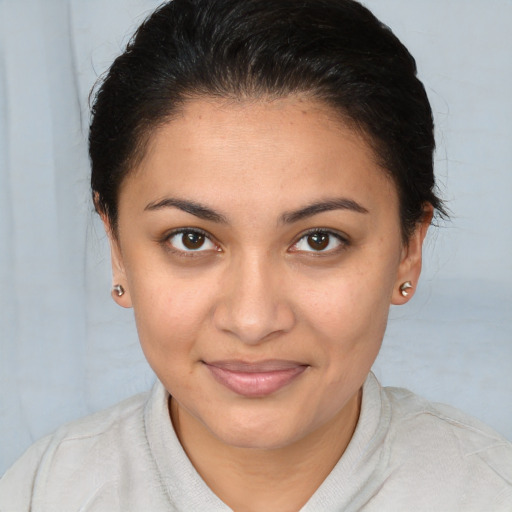 Joyful white young-adult female with medium  brown hair and brown eyes