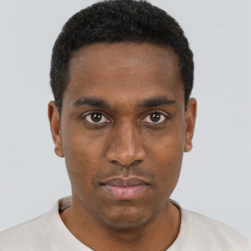 Neutral black young-adult male with short  black hair and brown eyes