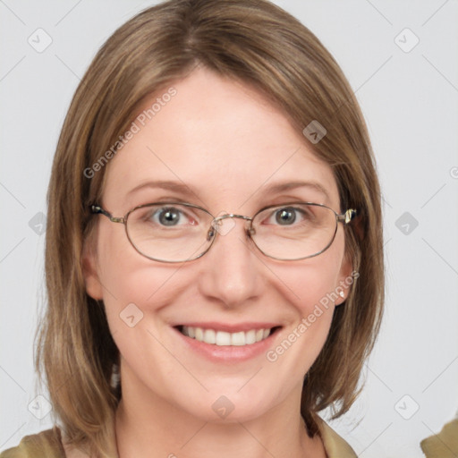 Joyful white adult female with medium  brown hair and blue eyes