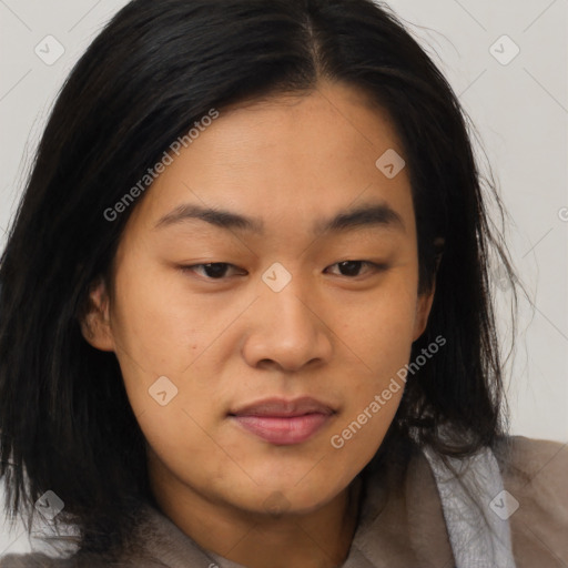 Joyful asian young-adult female with medium  black hair and brown eyes