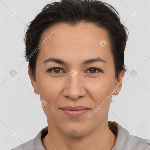 Joyful white adult female with short  brown hair and brown eyes