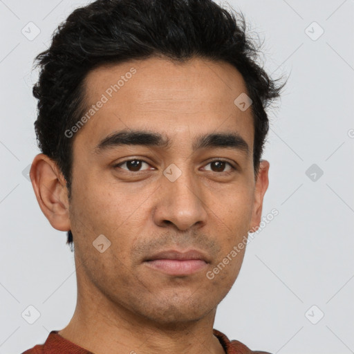Neutral white young-adult male with short  black hair and brown eyes