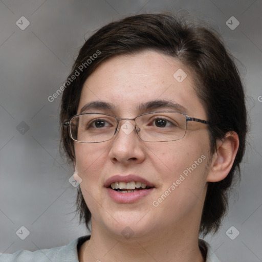 Joyful white adult female with medium  brown hair and brown eyes