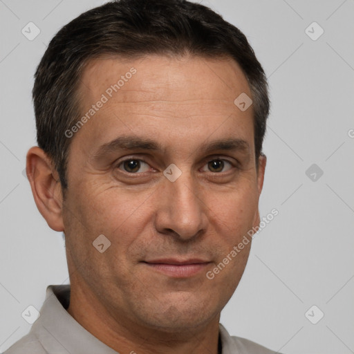 Joyful white adult male with short  brown hair and brown eyes