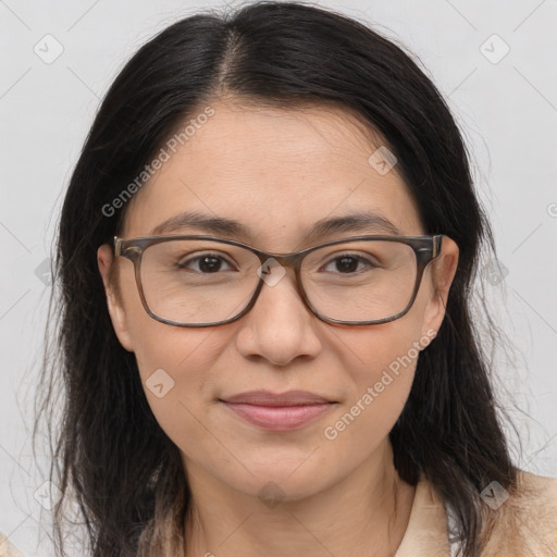 Joyful white adult female with medium  brown hair and brown eyes