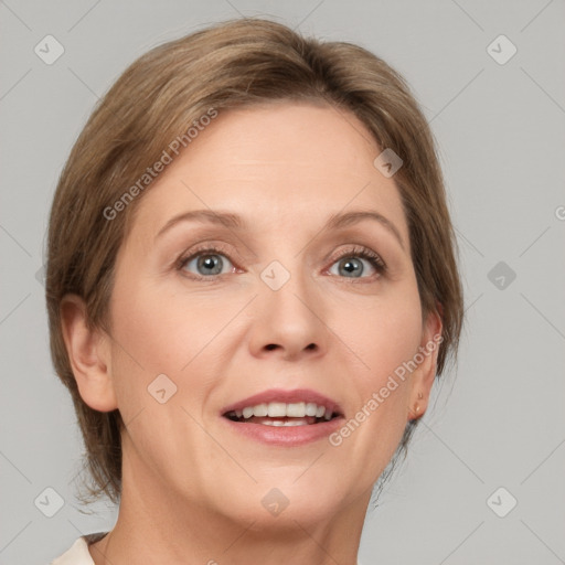 Joyful white adult female with medium  brown hair and grey eyes