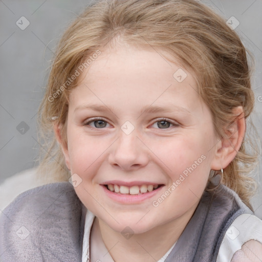 Joyful white child female with medium  brown hair and blue eyes