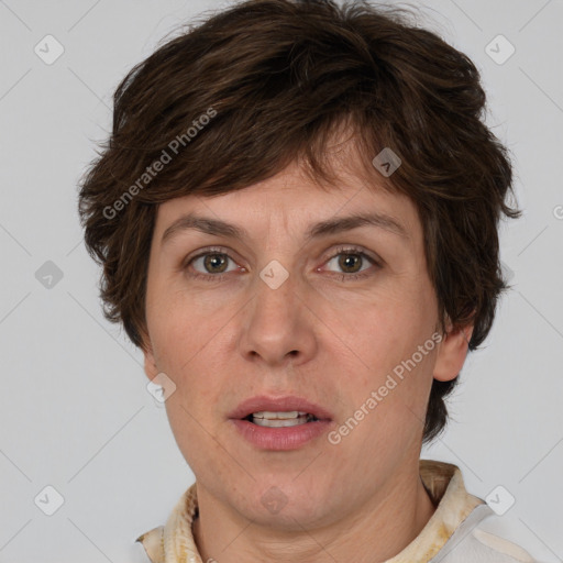 Joyful white adult female with short  brown hair and brown eyes