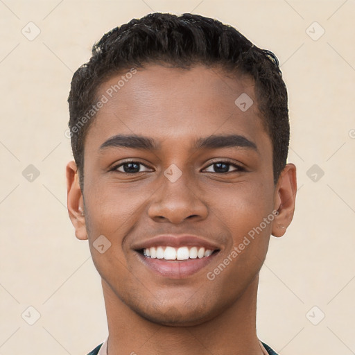 Joyful latino young-adult male with short  brown hair and brown eyes