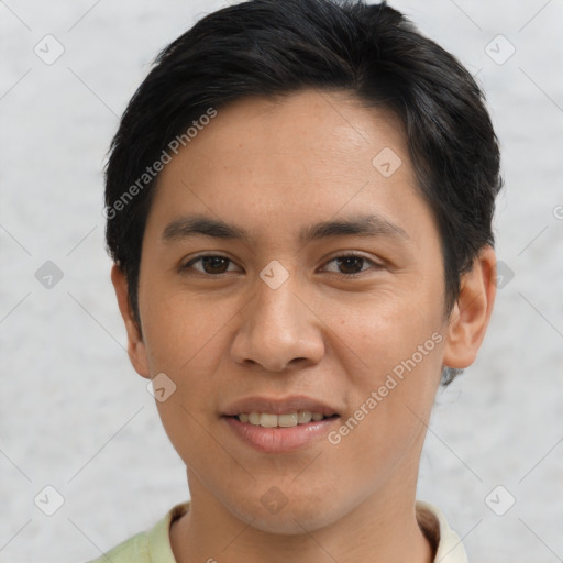 Joyful asian young-adult male with short  brown hair and brown eyes