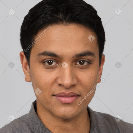 Joyful latino young-adult male with short  brown hair and brown eyes