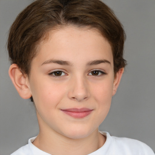 Joyful white child female with short  brown hair and brown eyes