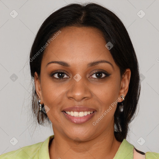 Joyful black young-adult female with medium  brown hair and brown eyes