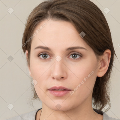 Neutral white young-adult female with medium  brown hair and grey eyes