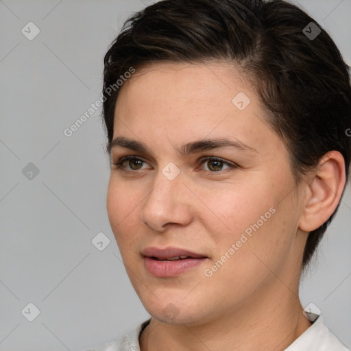 Joyful white young-adult female with medium  brown hair and brown eyes