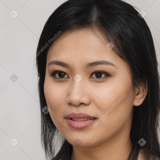 Joyful asian young-adult female with long  brown hair and brown eyes